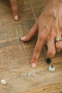 How to use sticky wrap for safe jewelry packing while you travel - pro jewelry care advice from J'Adorn Designs gemstone jewelry