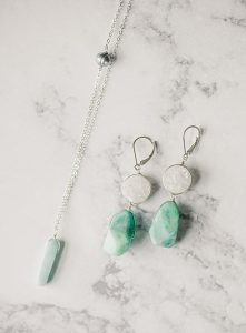 Sterling silver gemstone jewelry set by J'Adorn Designs featuring necklace and earrings. Necklace is an amazonite spike on a silver chain with grey freshwater pearl accent. Earrings are white druzy quartz with aqua amazonite drop stones with lever back earrings for comfort.