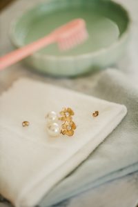 How to clean jewelry at home: Easy jewelry cleaning instructions using ingredients you already have at home! Jewelry care tips by J'Adorn Designs, custom jewelry and bridal accessories.