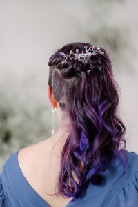 Amethyst and silver hair comb styled with a half up half down hairstyle for formal portraits. Handcrafted accessories by J'Adorn Designs.