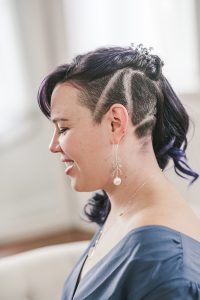 Undercut formal hairstyle with amethyst hair comb and aquamarine earrings with freshwater pearl drops. Sterling silver handmade jewelry by J'Adorn Designs.