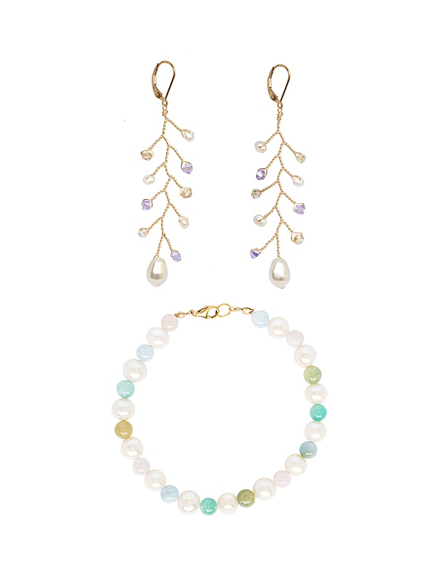 delicate bridal jewelry vine earrings and coordinating bracelet flat lay in gold jadorn designs custom jewelry