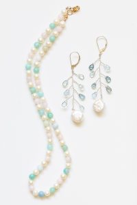 Cute colorful jewelry set in pastel colors by J'Adorn Designs artisan jewelry. Jewelry set features a rainbow pastel pearl necklace with beryl gemstones and a pair of delicate silver vine earrings with aquamarine teardrops and coin pearls. Handcrafted jewelry and luxury bridal accessories made in Maryland.